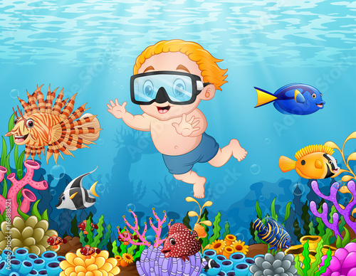 Little boy diving in the sea