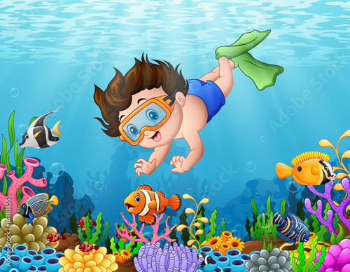 Little boy diving in the sea