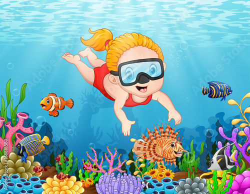 Little girl diving in the sea
