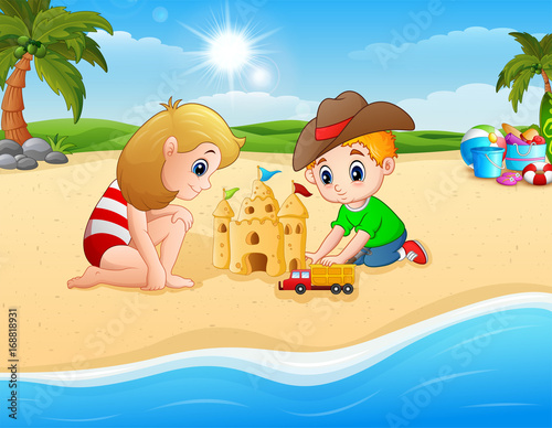 Kids making sand castle and truck toy