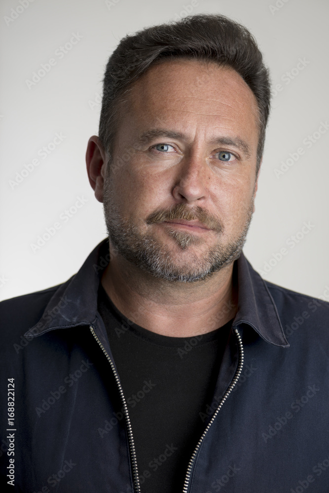 Portrait of Bearded Adult White Male Over Gray Background Portrait of Bearded Adult White Male Over Gray Background
