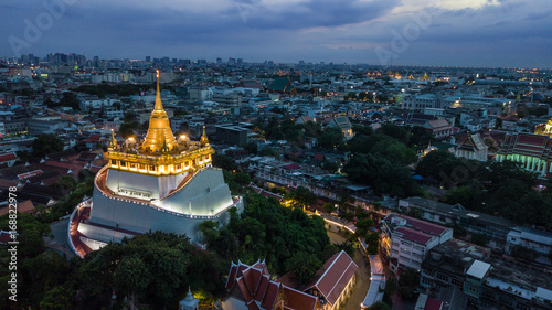  'Golden Mountain '  Wat Saket Ratcha Wora Maha Wihan popular Bangkok tourist attraction , Landmarks of bangkok Thailand .  top view © meen_na
