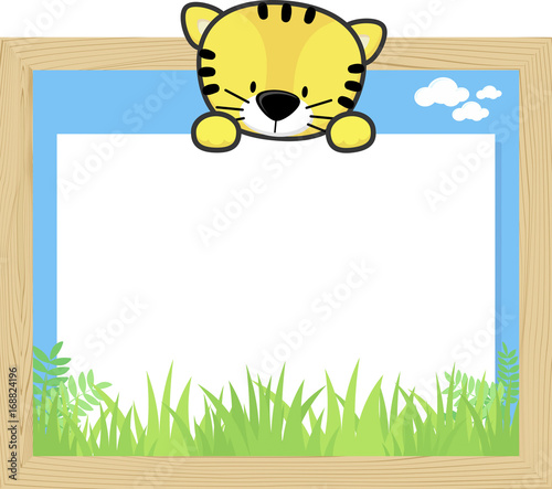 Fototapeta Naklejka Na Ścianę i Meble -  wood frame with cute baby tiger and blank board for copy space, design for children