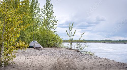 Two tents beside a revier