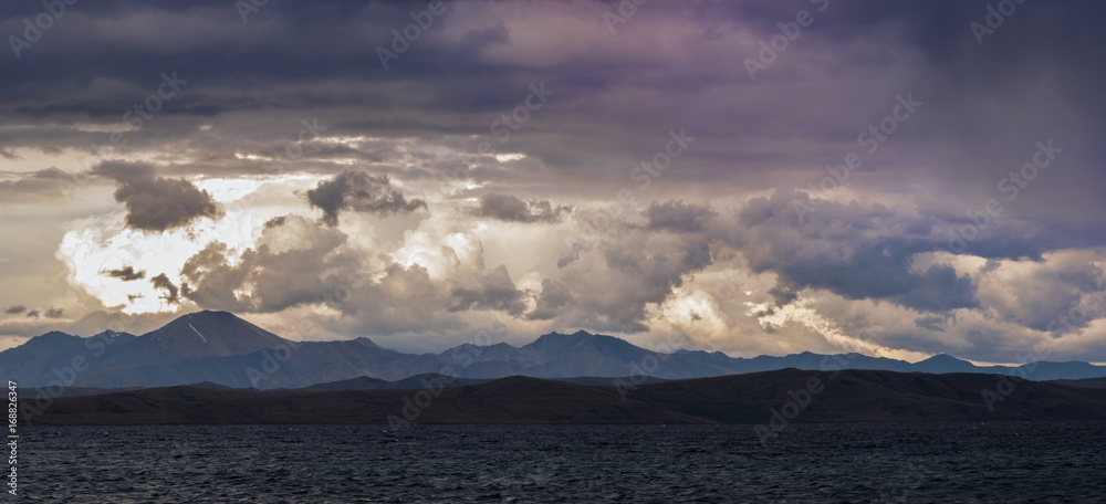 dark fluffy clouds on sky over sea during fiery sunset
dark fluffy clouds on sky over sea during fiery sunset