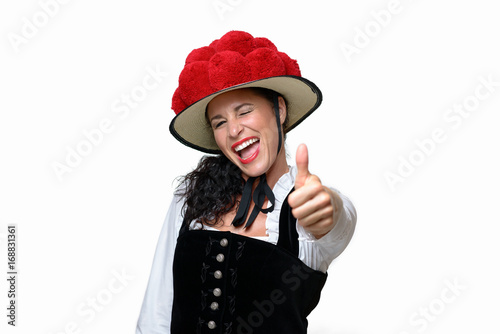 Enthusiastic laughing young Black Forest waitress