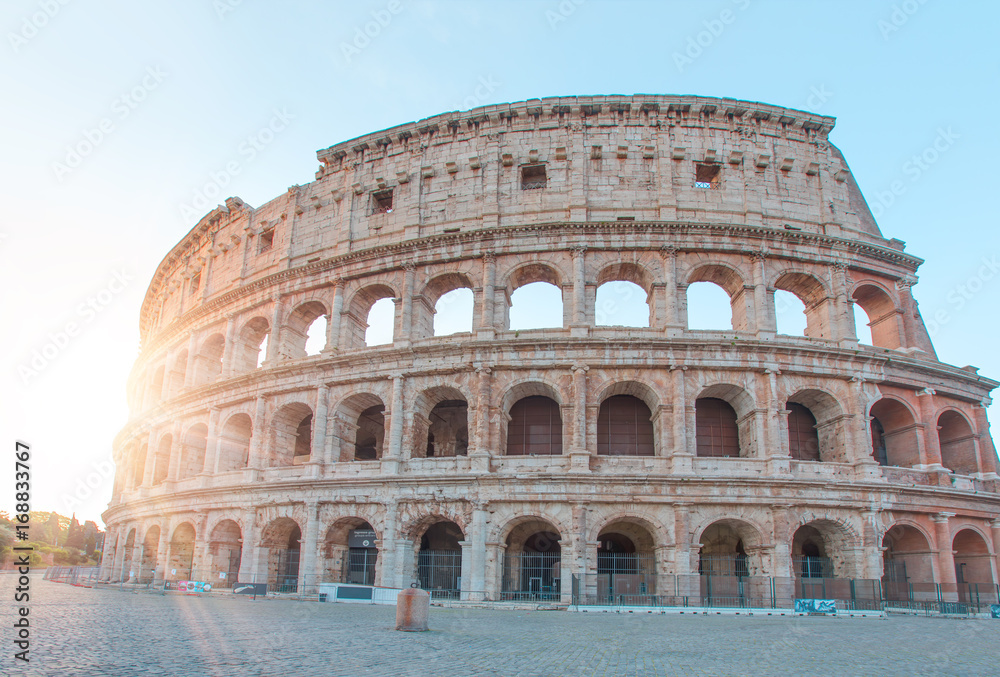 Colosseum at sunrise, Rome. Rome best known architecture and landmark