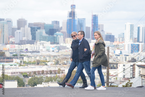 Photography Happy family crossing the street in San Francisco