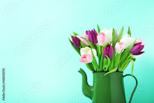 Wallpaper Mural Bouquet of tulips in jug on green background Torontodigital.ca