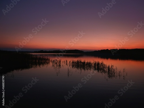 Zachód słońca nad jeziorem © P.Ch. Fotografia