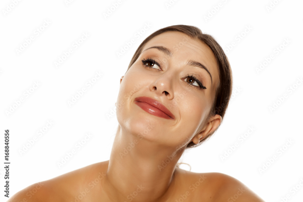 carefree young woman with a satisfied expression carefree young woman with a satisfied expression