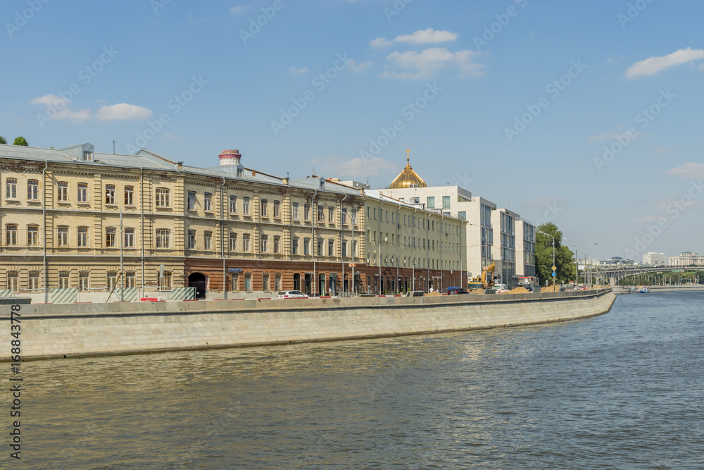 : View of riverside of Moscow river and floating passenger boats