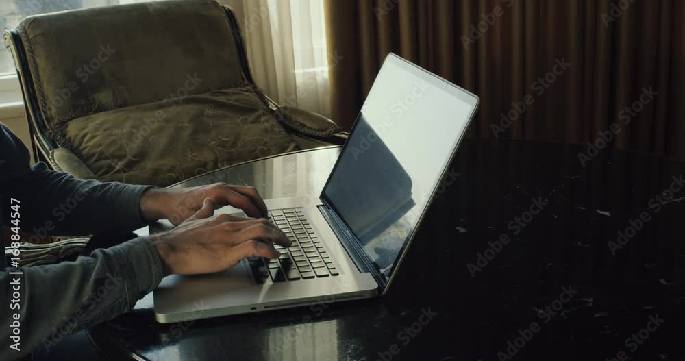 Person typing on laptop keyboard, freelancer sending project to client by email. 4k Person typing on laptop keyboard, freelancer sending project to client by email. 4k