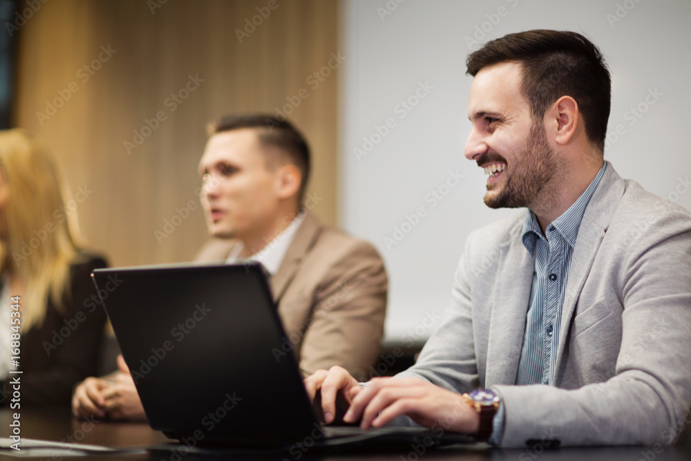 Perspective business colleagues in conference meeting room Perspective business colleagues in conference meeting room