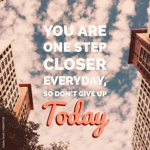 Inspirational motivational quote "you are one step closer everyday, so don't give up today" on buildings and sky background.