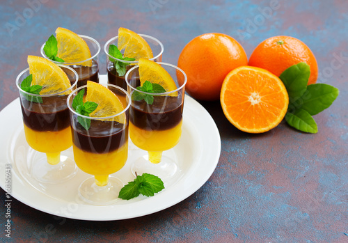 Orange chocolate mousse in portioned cups.