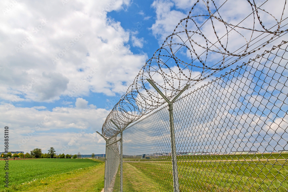 Fototapeta premium fence with barbed wire