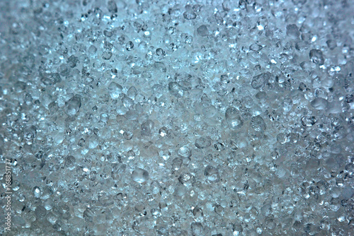 Billede på lærred Background of citric acid granules, macro