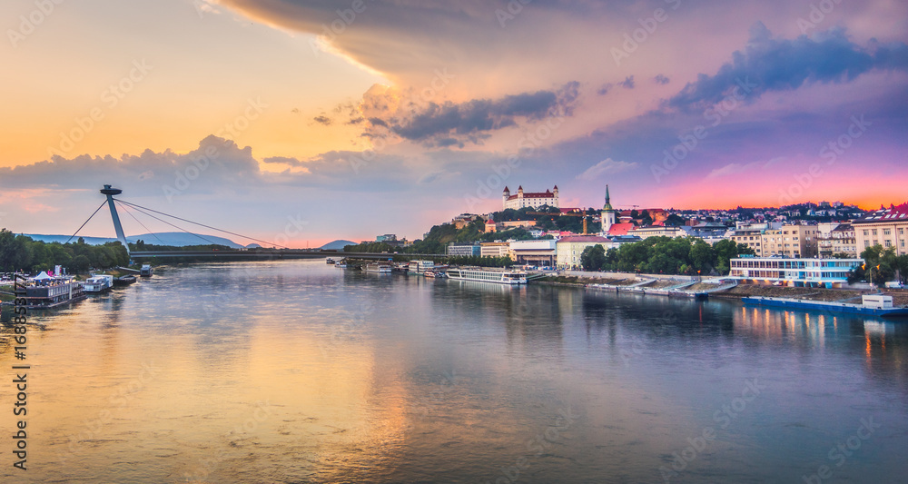 Cityscape of Bratislava, Slovakia at Sunset  as Seen from a Bridge over Danube River Towards Old Town of Bratislava.