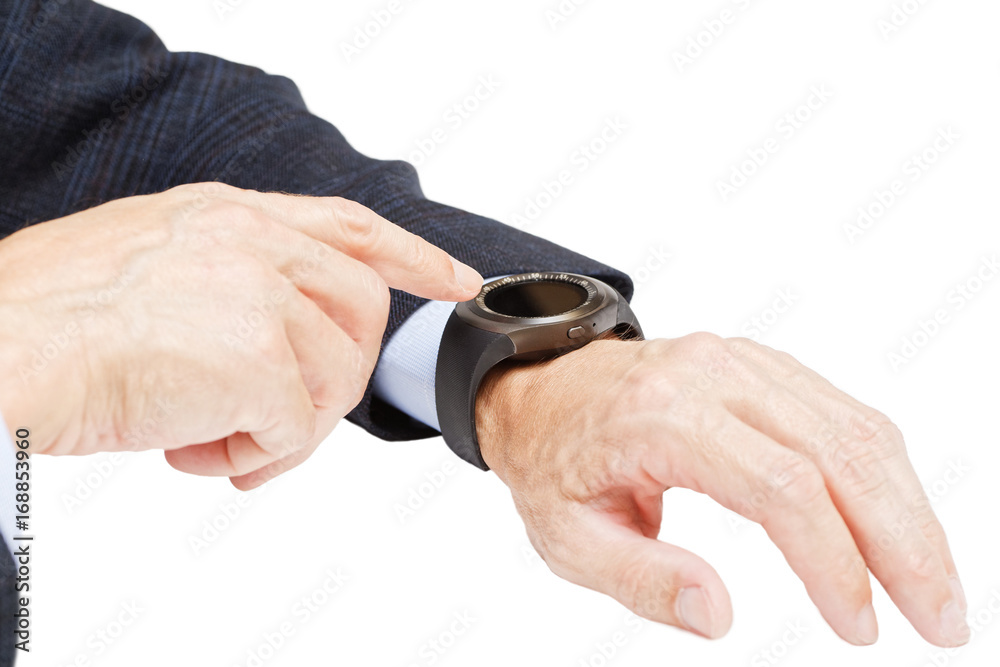 Closeup hand of man using his smartwatch. Shallow focus. Isolated on white. Closeup hand of man using his smartwatch. Shallow focus. Isolated on white.
