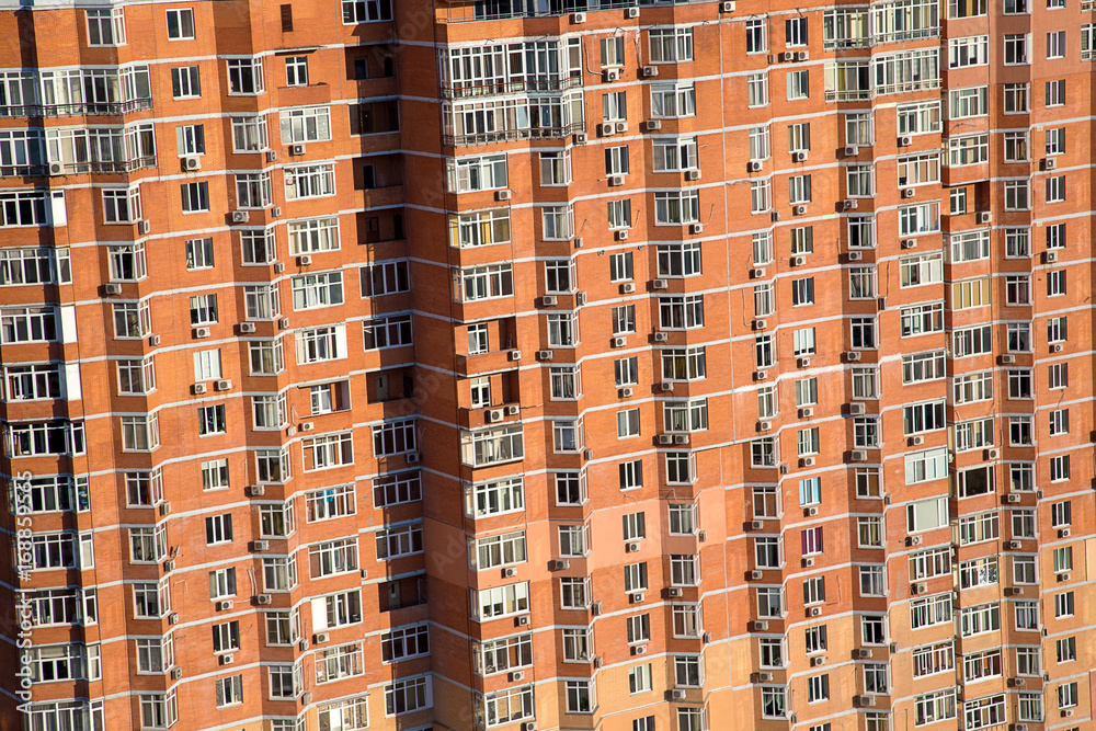 Lots windows of modern apartment skyscraper house