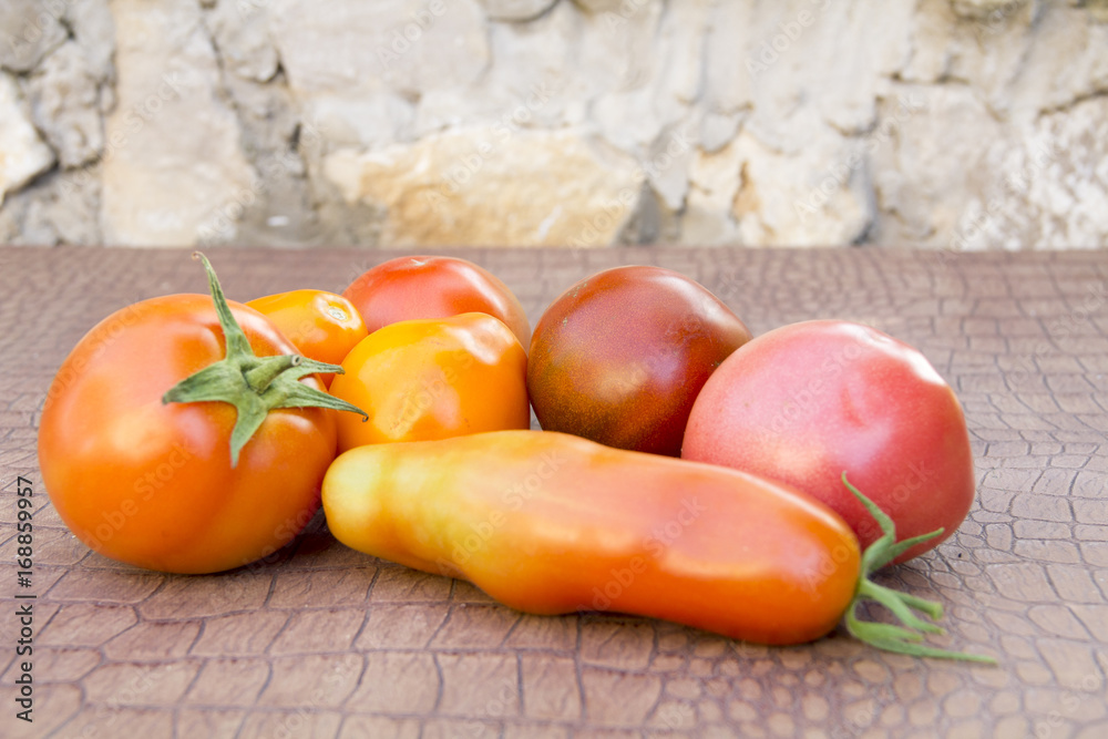 Ripe tomatoes of different varieties
