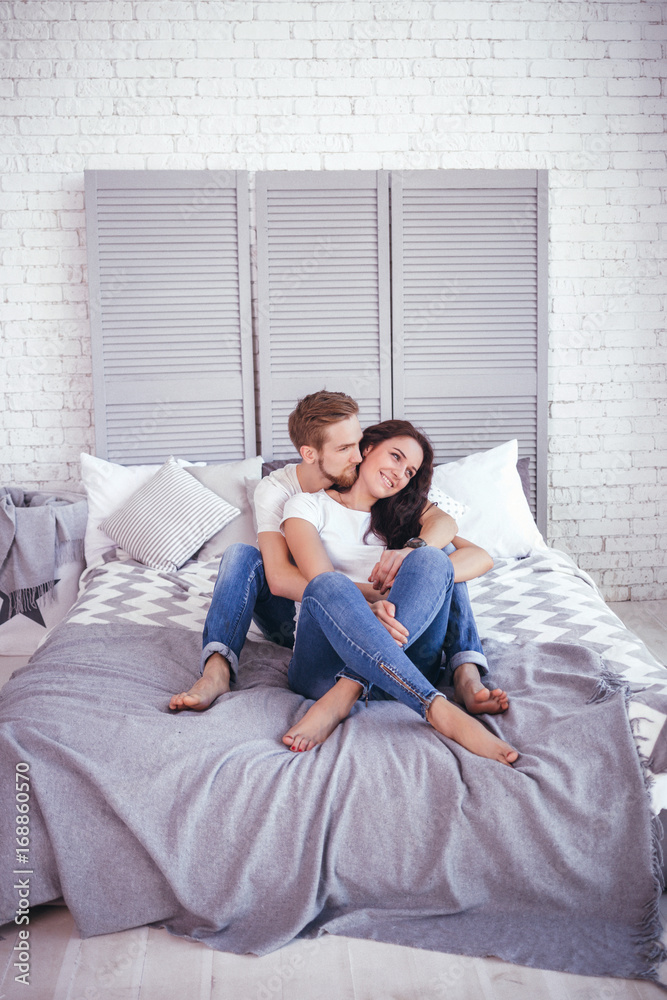 Young loving couple in the bed Young loving couple in the bed