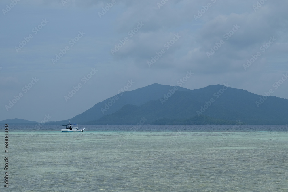 fishing boat at the coral reef close to Karimunjawa island