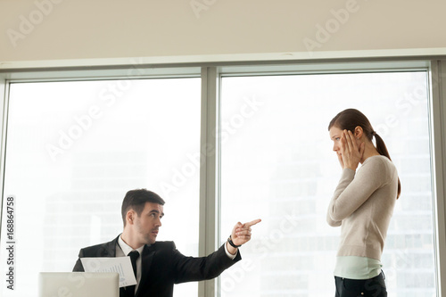 Φωτογραφία Bad ceo firing incompetent intern for poor performance result, angry boss dismis