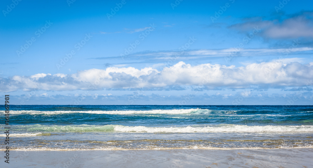 Tropical sandy beach and sea of Atlantic ocean in Spain.