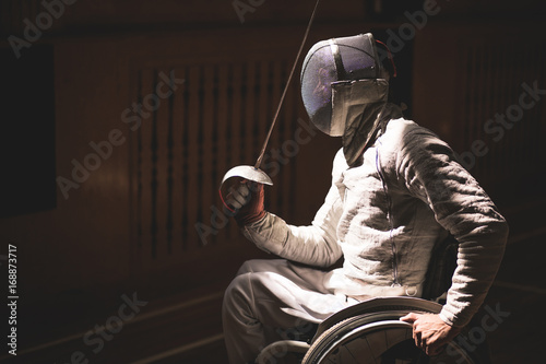 Fotografija Portrait of male paralympic wheelchair fencer. sport concept