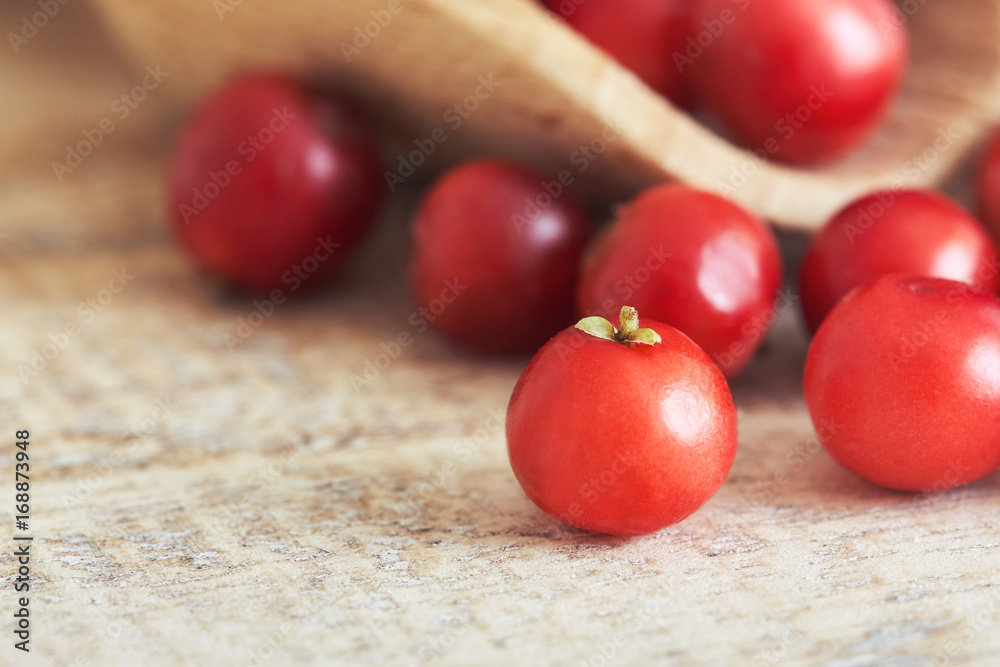 Closeup of fresh ripe cranberries on wooden background. Copy space Closeup of fresh ripe cranberries on wooden background. Copy space