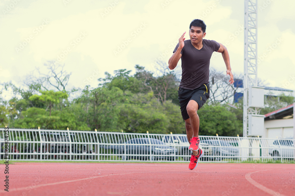 Young runners are jogging on the treadmill and are happy. Young runners are jogging on the treadmill and are happy.
