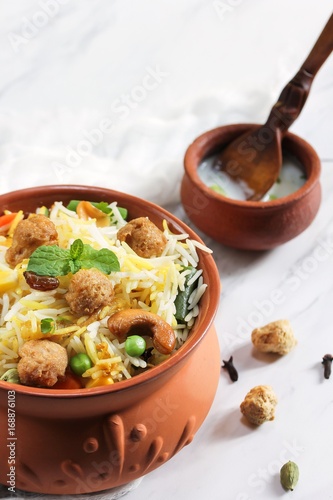 Soya chunks  Biryani / Vegetable Soy Pilaf served in clay pot photo