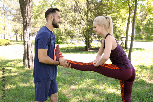 Young couple practicing spo...