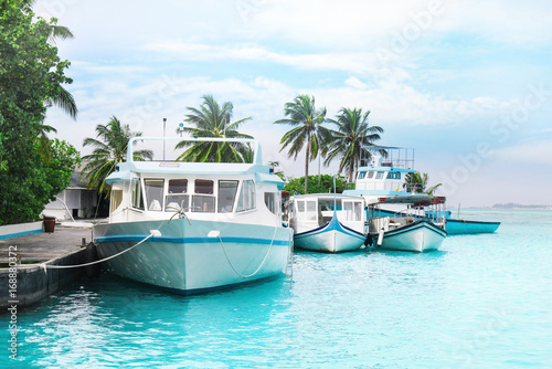 Modern boats at tropical resort