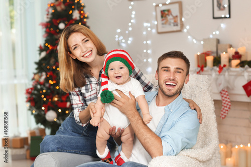 Happy parents with baby in ...