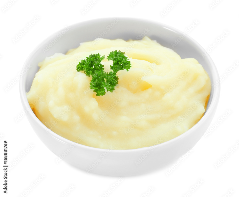 Bowl with mashed potatoes on white background