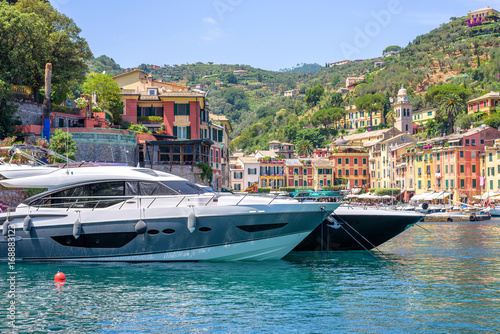 Beautiful rich yacht parked near Portofino port in Italy. Closeup photo.