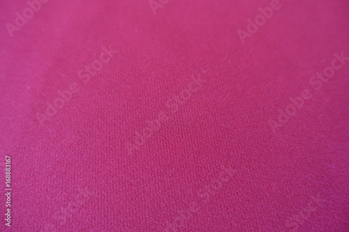 Close up of bright pink plain fabric