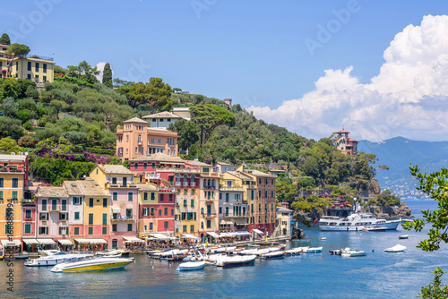Beautiful daylight view to Portofino streets and ships on water. Italy beauties. © frimufilms