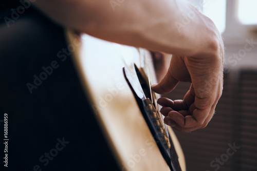 Man playing the guitar, close-up