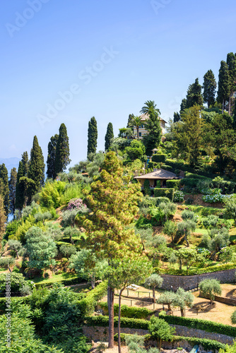 Daylight view to mountain with park and full of green trees. Portofino Italy photo