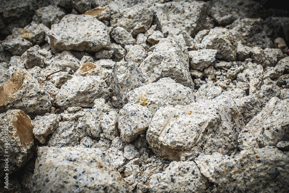 Remains of broken concrete walls.