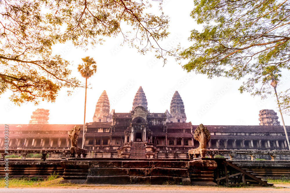 angkor wat with yellow and orange light in sun rise morning, Siem Reap, camodia