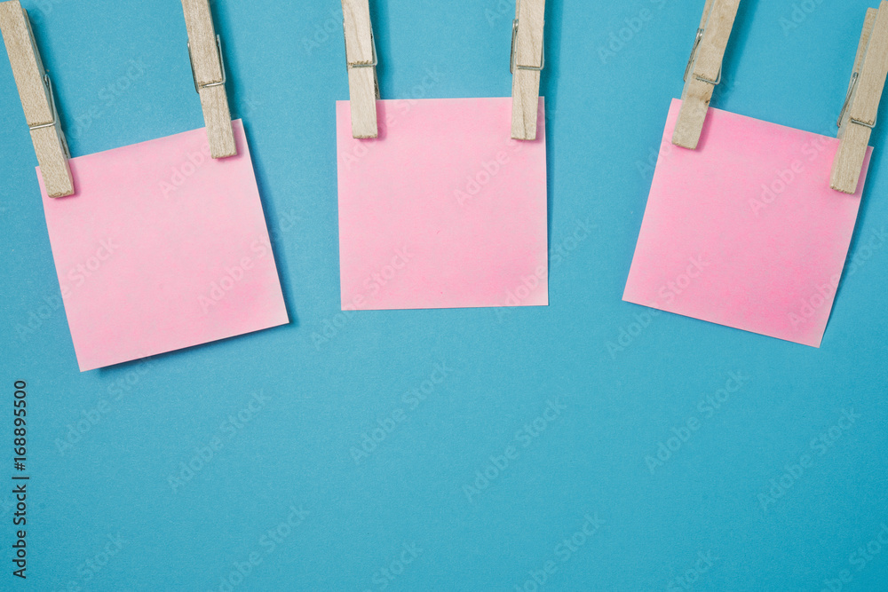 Sticky note on pastel color background. Sticky note on pastel color background.