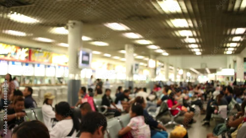Blurred of Asia People sitting and waiting for bus car at terminal transportation at Mo Chit station transport in Thailand. Blurred of Asia People sitting and waiting for bus car at terminal transportation at Mo Chit station transport in Thailand.
