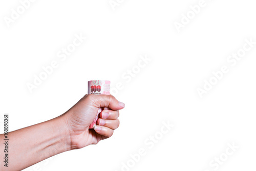 Thai cash in Asian woman's hand on white background with clipping path