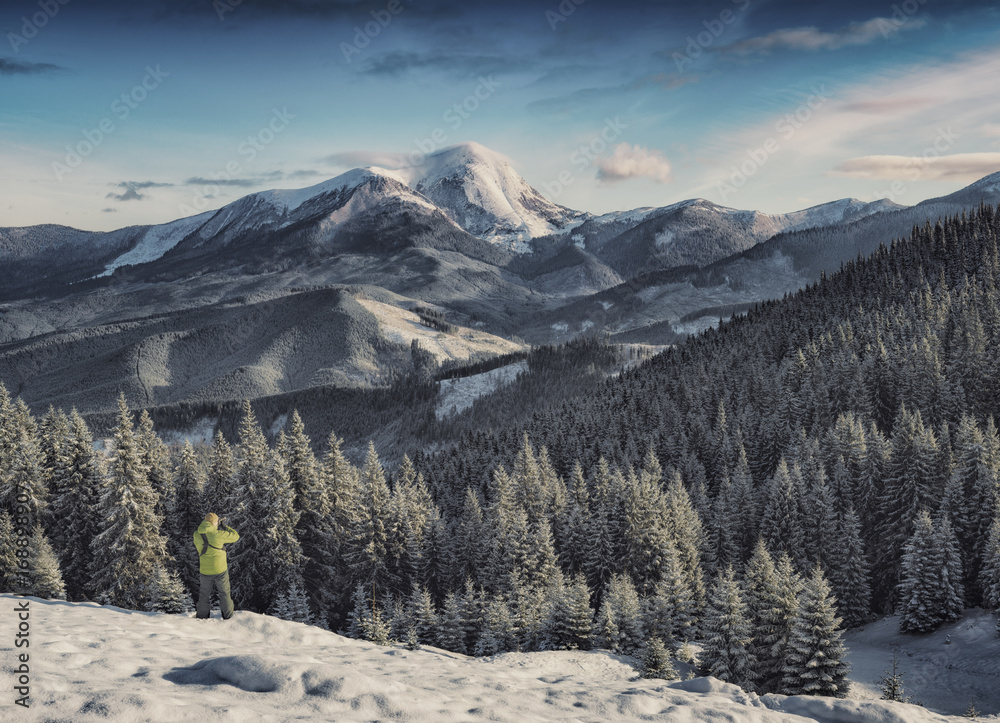 Photographer in a winter Carpathians. Instagram stylization