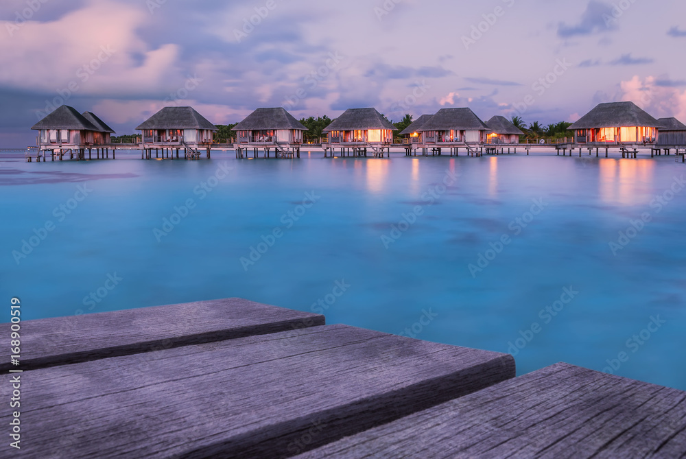 Wonderful twilight time at tropical beach resort in Maldives